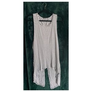 This shirt is super cute with jeans or shorts, Its oversized & Super soft too!